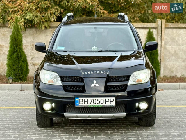 Міцубісі Аутлендер 2007 у Одесі на Automoto.ua Чорний Міцубісі Аутлендер, об'ємом двигуна 2.4 л та пробігом 201 тис. км за 7700 $, фото 38 на Automoto.ua