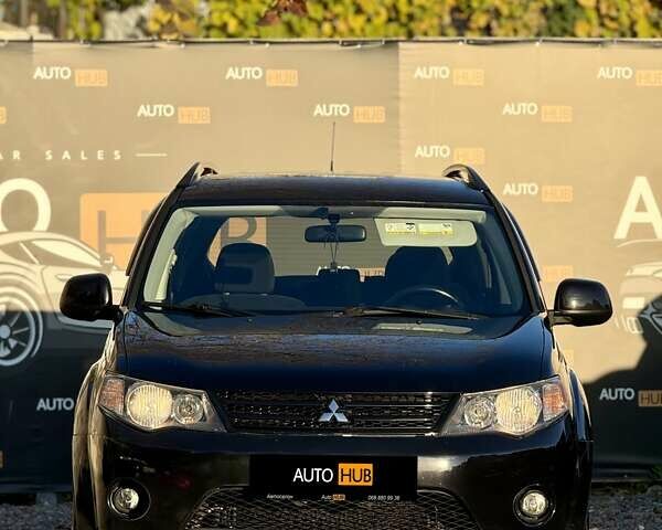 Черный Мицубиси Аутлендер, объемом двигателя 3 л и пробегом 198 тыс. км за 9500 $, фото 2 на Automoto.ua