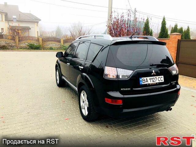 Черный Мицубиси Аутлендер, объемом двигателя 3 л и пробегом 230 тыс. км за 8999 $, фото 3 на Automoto.ua