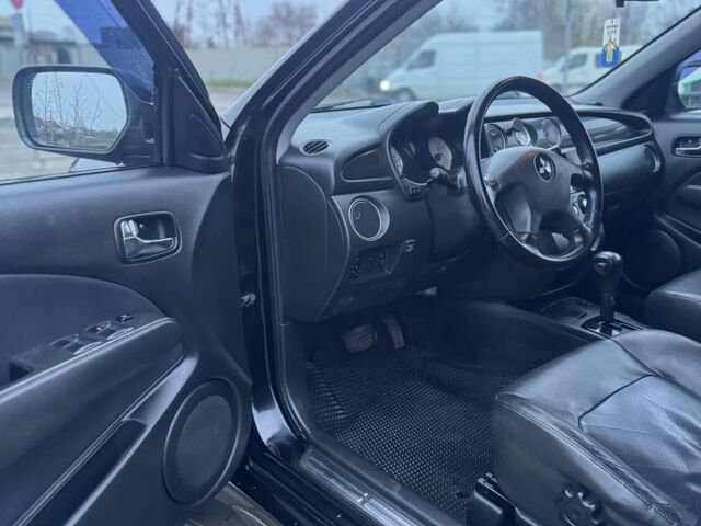 Чорний Міцубісі Аутлендер, об'ємом двигуна 2.4 л та пробігом 202 тис. км за 5800 $, фото 10 на Automoto.ua