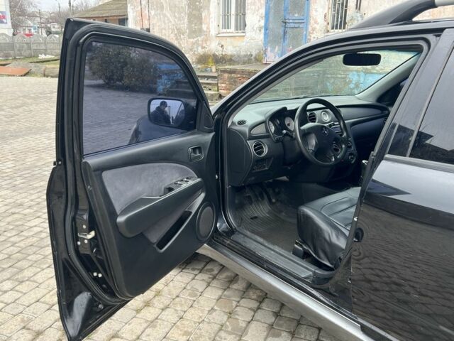 Чорний Міцубісі Аутлендер, об'ємом двигуна 2 л та пробігом 220 тис. км за 6299 $, фото 16 на Automoto.ua