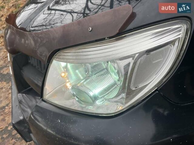 Чорний Міцубісі Аутлендер, об'ємом двигуна 2.4 л та пробігом 213 тис. км за 6850 $, фото 11 на Automoto.ua