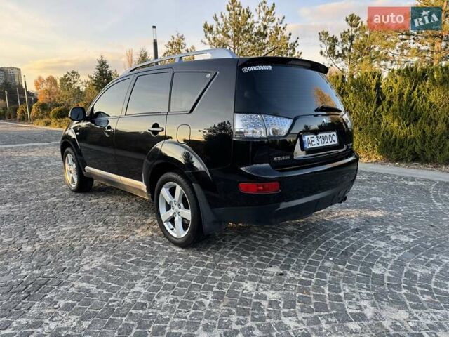 Черный Мицубиси Аутлендер, объемом двигателя 3 л и пробегом 205 тыс. км за 11300 $, фото 2 на Automoto.ua