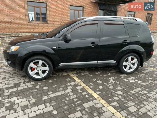 Черный Мицубиси Аутлендер, объемом двигателя 3 л и пробегом 200 тыс. км за 7999 $, фото 11 на Automoto.ua
