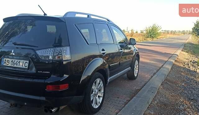 Черный Мицубиси Аутлендер, объемом двигателя 1.97 л и пробегом 244 тыс. км за 9000 $, фото 4 на Automoto.ua