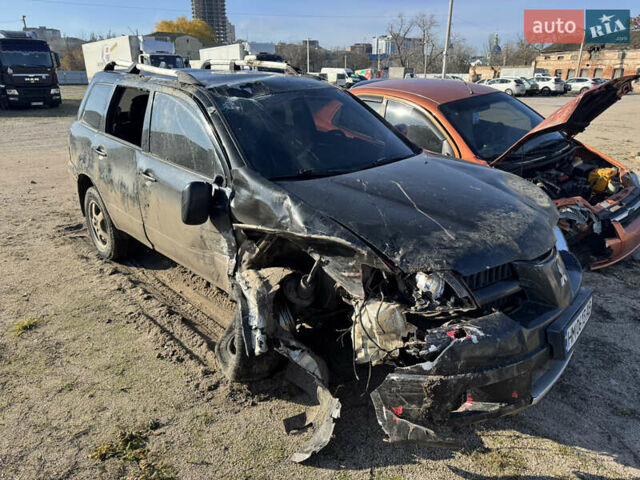 Черный Мицубиси Аутлендер, объемом двигателя 2 л и пробегом 258 тыс. км за 2200 $, фото 1 на Automoto.ua