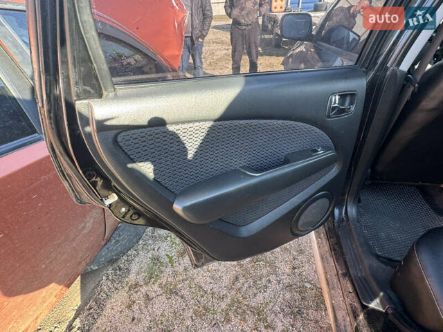 Черный Мицубиси Аутлендер, объемом двигателя 2 л и пробегом 258 тыс. км за 2200 $, фото 19 на Automoto.ua