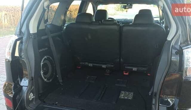 Черный Мицубиси Аутлендер, объемом двигателя 1.97 л и пробегом 244 тыс. км за 9000 $, фото 21 на Automoto.ua