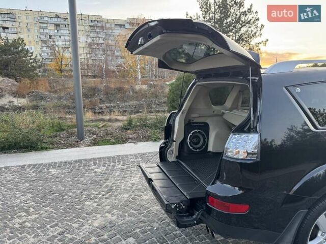 Черный Мицубиси Аутлендер, объемом двигателя 3 л и пробегом 205 тыс. км за 11300 $, фото 26 на Automoto.ua