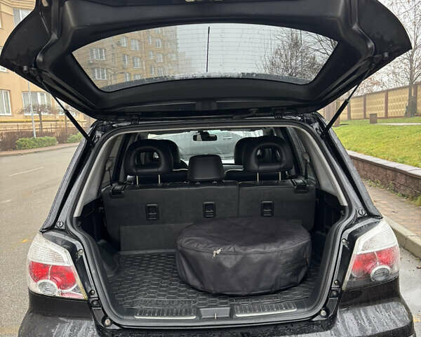 Чорний Міцубісі Аутлендер, об'ємом двигуна 2.4 л та пробігом 169 тис. км за 8000 $, фото 12 на Automoto.ua