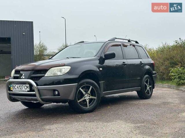 Черный Мицубиси Аутлендер, объемом двигателя 2 л и пробегом 295 тыс. км за 5300 $, фото 13 на Automoto.ua