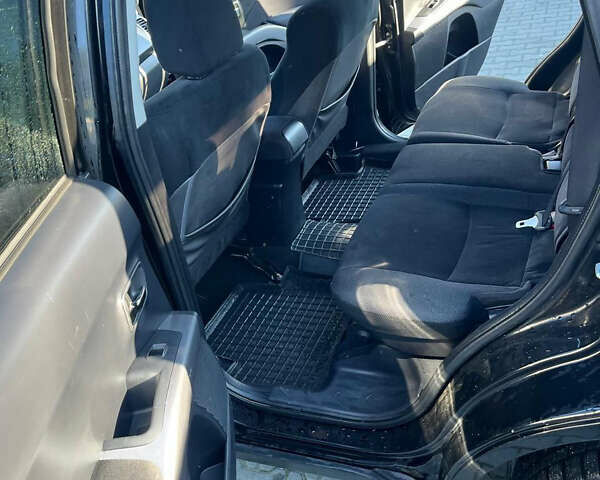 Чорний Міцубісі Аутлендер, об'ємом двигуна 2 л та пробігом 330 тис. км за 7500 $, фото 2 на Automoto.ua