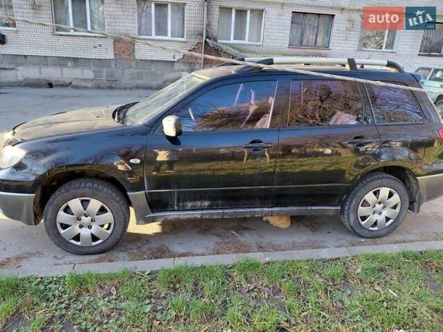 Чорний Міцубісі Аутлендер, об'ємом двигуна 2 л та пробігом 260 тис. км за 5500 $, фото 2 на Automoto.ua