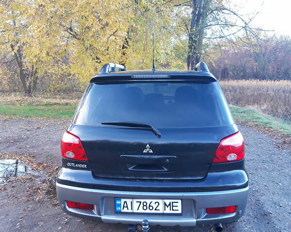 Мицубиси Аутлендер 2007 в Мироновке на Automoto.ua Черный Мицубиси Аутлендер, объемом двигателя 2 л и пробегом 278 тыс. км за 6500 $, фото 5 на Automoto.ua