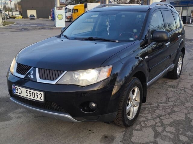 Черный Мицубиси Аутлендер, объемом двигателя 2 л и пробегом 290 тыс. км за 4900 $, фото 2 на Automoto.ua
