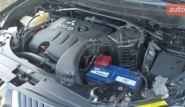 Черный Мицубиси Аутлендер, объемом двигателя 1.97 л и пробегом 244 тыс. км за 9000 $, фото 29 на Automoto.ua