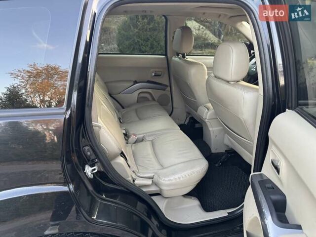 Черный Мицубиси Аутлендер, объемом двигателя 3 л и пробегом 205 тыс. км за 11300 $, фото 23 на Automoto.ua