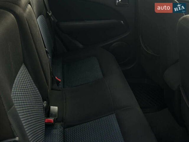 Черный Мицубиси Аутлендер, объемом двигателя 2.4 л и пробегом 320 тыс. км за 5999 $, фото 12 на Automoto.ua