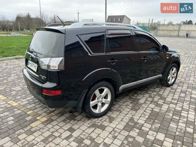 Черный Мицубиси Аутлендер, объемом двигателя 3 л и пробегом 200 тыс. км за 7999 $, фото 15 на Automoto.ua