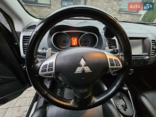 Черный Мицубиси Аутлендер, объемом двигателя 3 л и пробегом 238 тыс. км за 10800 $, фото 30 на Automoto.ua