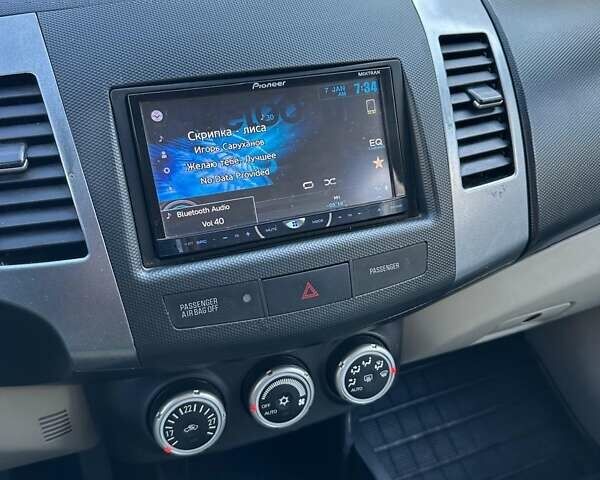 Міцубісі Аутлендер 2007 у Одесі на Automoto.ua Чорний Міцубісі Аутлендер, об'ємом двигуна 3 л та пробігом 187 тис. км за 8700 $, фото 14 на Automoto.ua