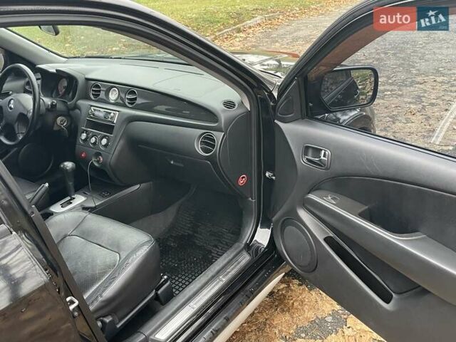 Чорний Міцубісі Аутлендер, об'ємом двигуна 2.4 л та пробігом 213 тис. км за 6850 $, фото 19 на Automoto.ua