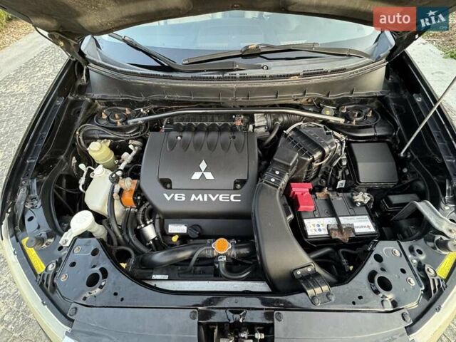Черный Мицубиси Аутлендер, объемом двигателя 3 л и пробегом 205 тыс. км за 11300 $, фото 30 на Automoto.ua