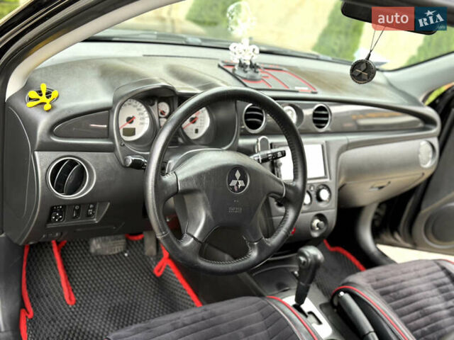 Міцубісі Аутлендер 2007 у Одесі на Automoto.ua Чорний Міцубісі Аутлендер, об'ємом двигуна 2.4 л та пробігом 201 тис. км за 7700 $, фото 51 на Automoto.ua