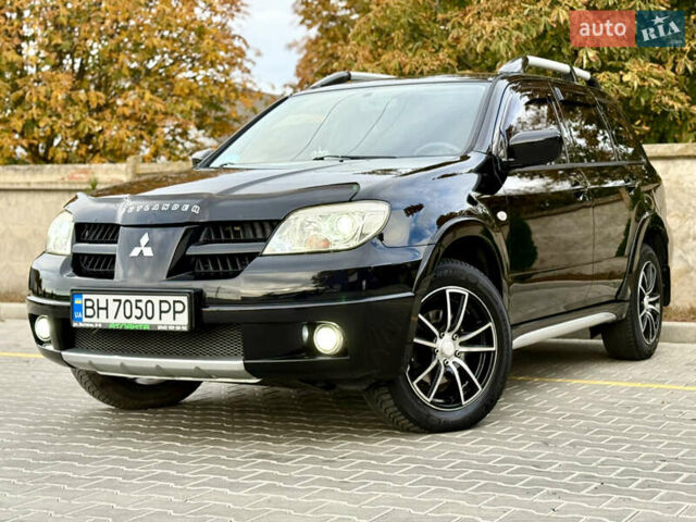 Міцубісі Аутлендер 2007 у Одесі на Automoto.ua Чорний Міцубісі Аутлендер, об'ємом двигуна 2.4 л та пробігом 201 тис. км за 7700 $, фото 35 на Automoto.ua