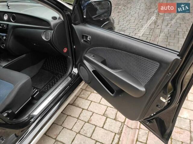 Черный Мицубиси Аутлендер, объемом двигателя 2 л и пробегом 180 тыс. км за 6000 $, фото 12 на Automoto.ua