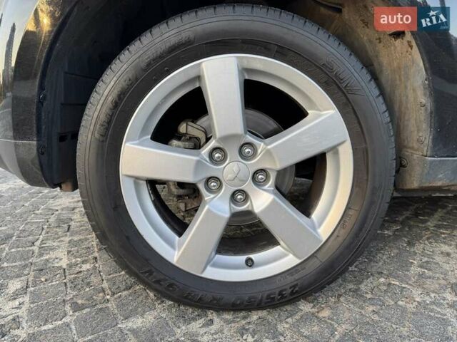 Черный Мицубиси Аутлендер, объемом двигателя 3 л и пробегом 205 тыс. км за 11300 $, фото 32 на Automoto.ua