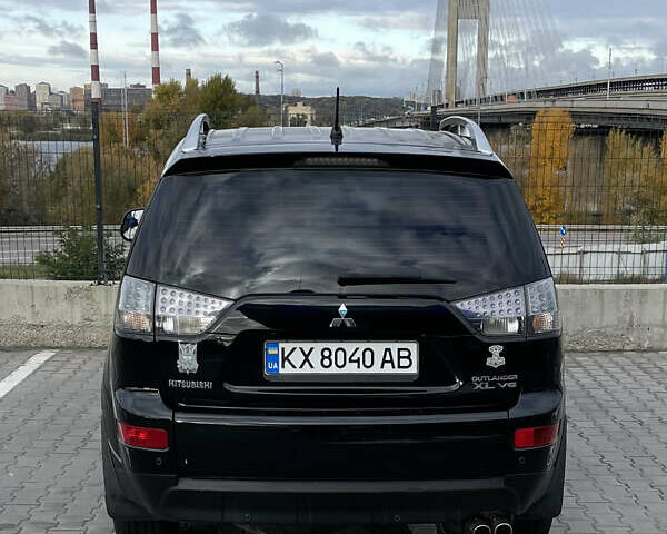 Міцубісі Аутлендер 2007 у Києві на Automoto.ua Чорний Міцубісі Аутлендер, об'ємом двигуна 3 л та пробігом 235 тис. км за 9000 $, фото 1 на Automoto.ua
