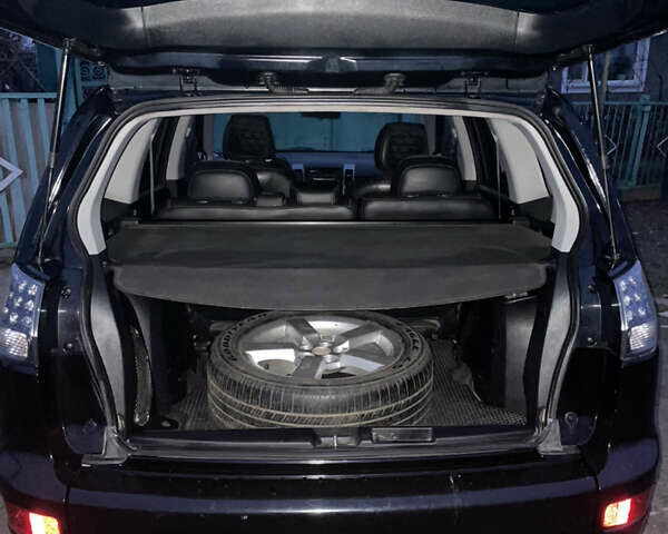 Чорний Міцубісі Аутлендер, об'ємом двигуна 3 л та пробігом 265 тис. км за 9200 $, фото 23 на Automoto.ua