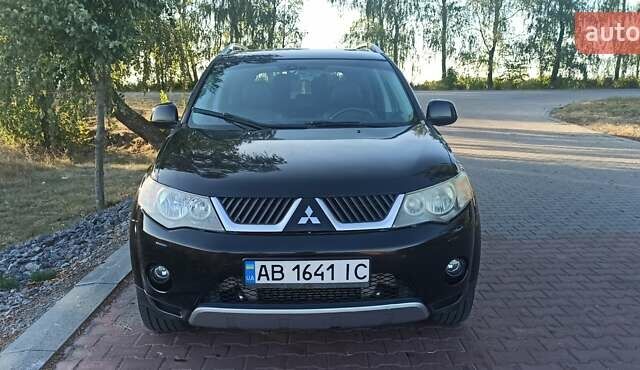 Черный Мицубиси Аутлендер, объемом двигателя 1.97 л и пробегом 244 тыс. км за 9000 $, фото 7 на Automoto.ua