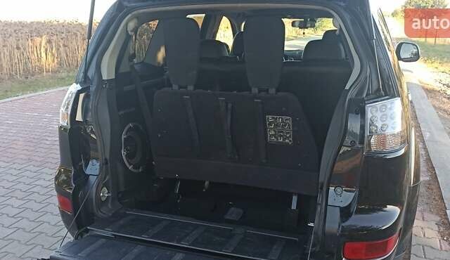 Черный Мицубиси Аутлендер, объемом двигателя 1.97 л и пробегом 244 тыс. км за 9000 $, фото 19 на Automoto.ua