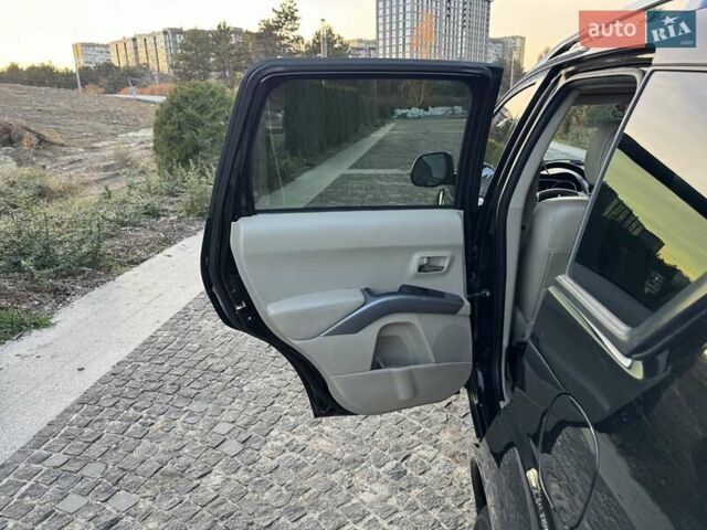 Черный Мицубиси Аутлендер, объемом двигателя 3 л и пробегом 205 тыс. км за 11300 $, фото 20 на Automoto.ua