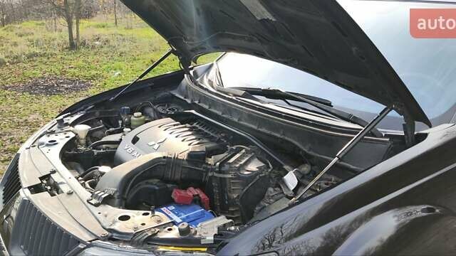 Черный Мицубиси Аутлендер, объемом двигателя 3 л и пробегом 190 тыс. км за 10000 $, фото 19 на Automoto.ua