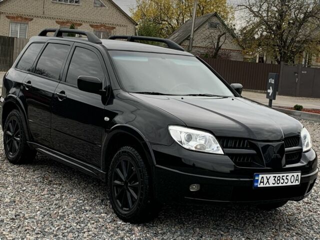 Міцубісі Аутлендер 2007 у Харкові на Automoto.ua Чорний Міцубісі Аутлендер, об'ємом двигуна 2.4 л та пробігом 240 тис. км за 5600 $, фото 3 на Automoto.ua