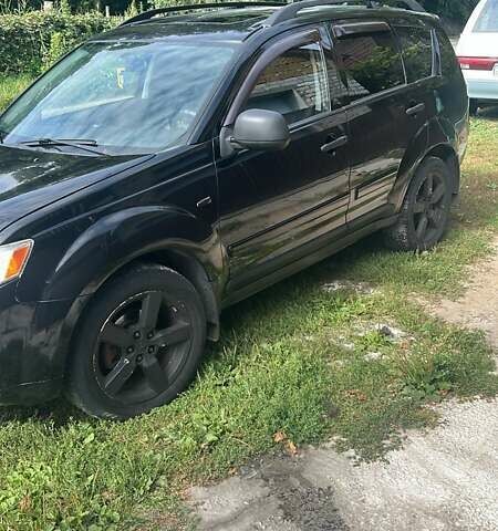 Черный Мицубиси Аутлендер, объемом двигателя 3 л и пробегом 257 тыс. км за 9200 $, фото 4 на Automoto.ua