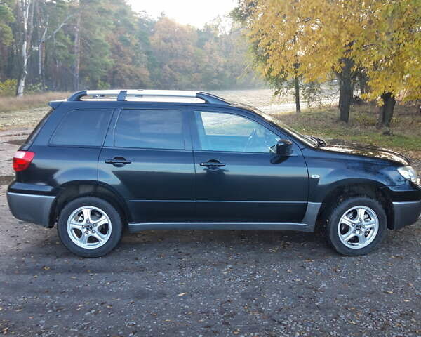 Мицубиси Аутлендер 2007 в Мироновке на Automoto.ua Черный Мицубиси Аутлендер, объемом двигателя 2 л и пробегом 278 тыс. км за 6500 $, фото 3 на Automoto.ua