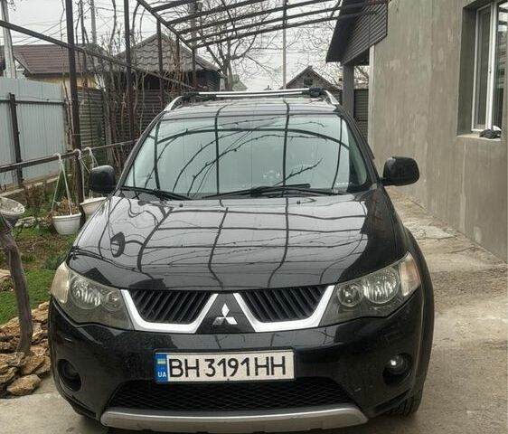 Черный Мицубиси Аутлендер, объемом двигателя 2.4 л и пробегом 240 тыс. км за 8500 $, фото 7 на Automoto.ua