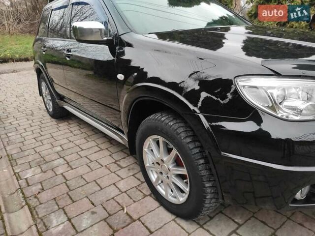 Черный Мицубиси Аутлендер, объемом двигателя 2 л и пробегом 180 тыс. км за 6000 $, фото 21 на Automoto.ua