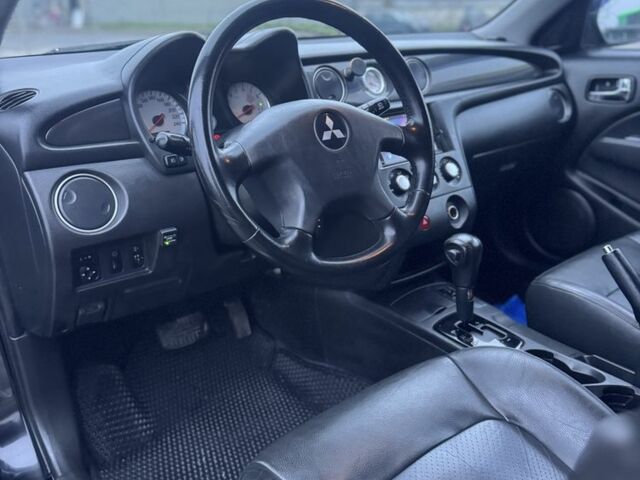 Чорний Міцубісі Аутлендер, об'ємом двигуна 2.4 л та пробігом 202 тис. км за 5800 $, фото 11 на Automoto.ua