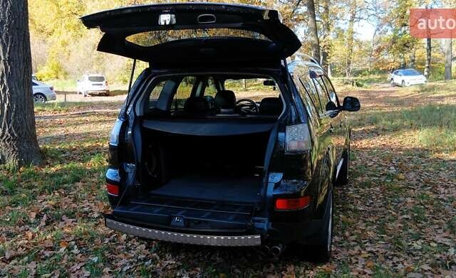 Міцубісі Аутлендер 2007 у Белой Церкве на Automoto.ua Чорний Міцубісі Аутлендер, об'ємом двигуна 3 л та пробігом 230 тис. км за 8800 $, фото 3 на Automoto.ua