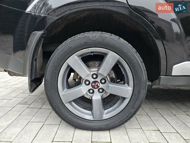 Черный Мицубиси Аутлендер, объемом двигателя 3 л и пробегом 238 тыс. км за 10800 $, фото 15 на Automoto.ua