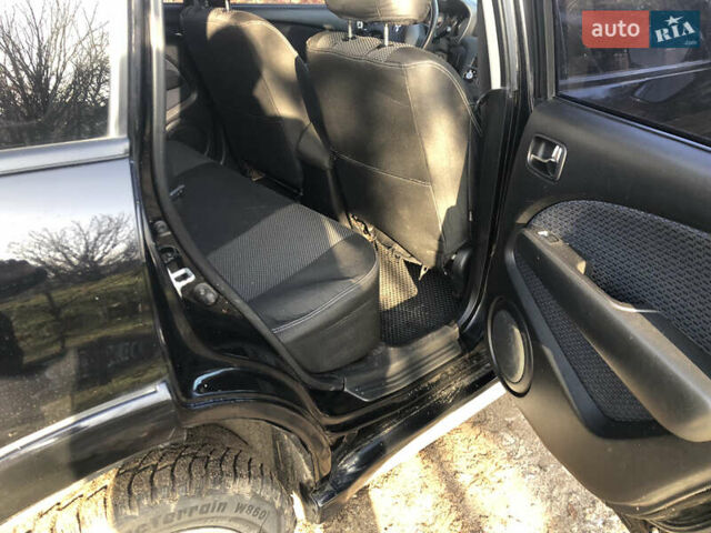 Черный Мицубиси Аутлендер, объемом двигателя 2.4 л и пробегом 260 тыс. км за 7200 $, фото 25 на Automoto.ua