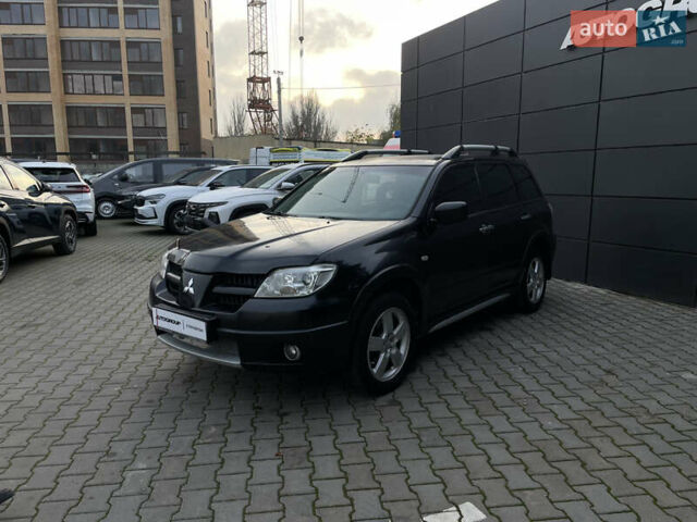 Черный Мицубиси Аутлендер, объемом двигателя 2.4 л и пробегом 248 тыс. км за 7300 $, фото 4 на Automoto.ua