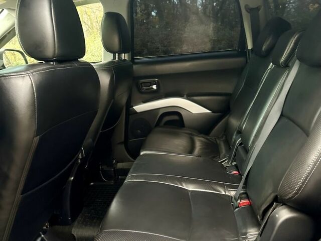 Черный Мицубиси Аутлендер, объемом двигателя 2.4 л и пробегом 230 тыс. км за 8500 $, фото 20 на Automoto.ua