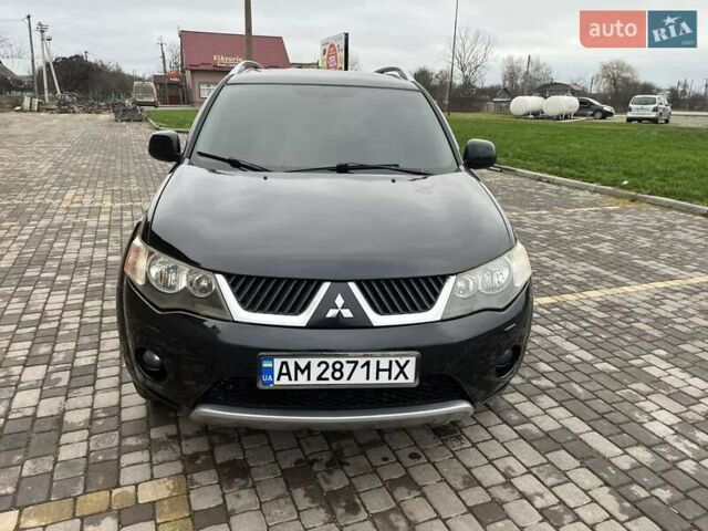 Черный Мицубиси Аутлендер, объемом двигателя 3 л и пробегом 200 тыс. км за 7999 $, фото 6 на Automoto.ua