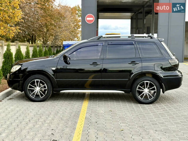 Міцубісі Аутлендер 2007 у Одесі на Automoto.ua Чорний Міцубісі Аутлендер, об'ємом двигуна 2.4 л та пробігом 201 тис. км за 7700 $, фото 29 на Automoto.ua